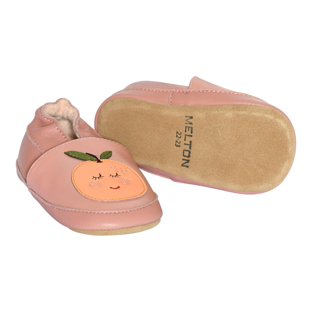 Orange leather slippers